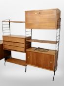 A teak Ladderax modular wall unit,