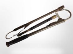 Three vintage fishing gaffs.