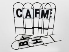 A group of metal letter signs, height 69cm.