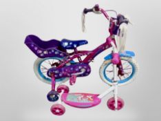 A girl's bike and a scooter.