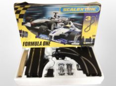 A Scalextric Formula-1 racing set in box.