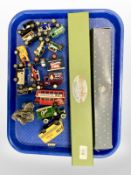 A collection of diecast Days Gone vehicles, sun dragon ornament, Ron Weasley's wand,