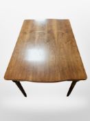 A 20th century Danish walnut dining table,