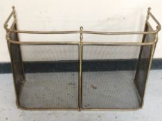 A 19th century brass fire guard,