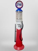 A plastic sweet dispenser in the form of a Esso petrol pump, height 226cm.
