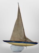 A vintage wooden pond yacht, length 72cm.