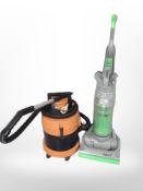 A Vax vacuum cleaner and a Dyson upright vacuum cleaner.