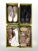 A crate containing several pairs of ladies Hotter shoes.