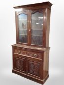 A late Victorian walnut secretaire bookcase,