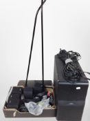 A group of Bose speakers, cables, pair of speaker stands.