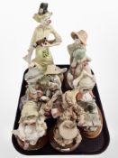 A group of G Armani Italian figures.