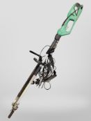 A Gardenline electric hedge trimmer