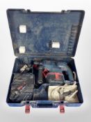 A Bosch hammer drill in case