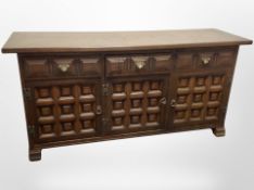 A reproduction oak sideboard,