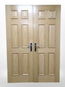 Two pairs of double oak veneered fire doors,