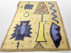 A contemporary machine-made abstract carpet, 237cm x 172cm.