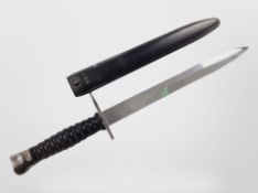 A Swiss M1957 bayonet in sheath