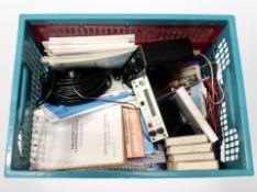 A crate containing radio receivers, flight maps, several observer books relating to aircraft, etc.