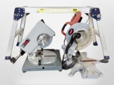 A collapsible aluminium work bench, and two circular mitre saws.