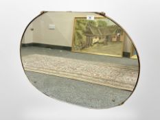 A 20th century mirror mounted on board, 75cm x 57cm.