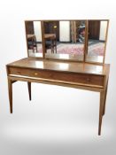 A teak mirror back dressing table,