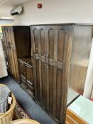 A pair of reproduction oak double door wardrobes,