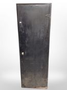 A pair of painted metal single door cabinets,