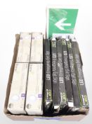 A box of contemporary LED spotlights and emergency exit signs.