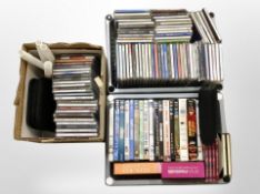 Four boxes of assorted CDs, DVDs, boxsets.