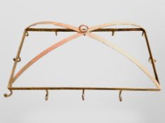 A wrought metal rack, width 100cm.