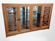 A Chinese hardwood glazed sideboard,