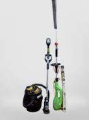 An electric pole hedge trimmer, a strimmer, three spirit levels,