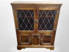 A pair of reproduction Jaycee Oak side cabinets,