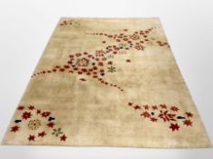 A contemporary machine-made carpet, 270cm x 182cm.