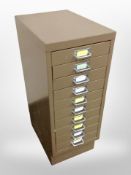 A metal 10-drawer index chest, height 72cm.