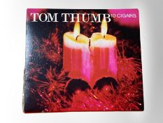 A sealed pack of 10 Tom Thumb mild cigars