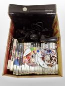 An Xbox 360 console with controllers and assorted games.