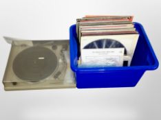 A Pioneer stero turntable PL-512, and a box containing assorted LP records.