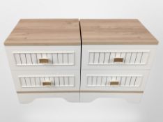 A pair of contemporary two-drawer bedside chests, width 44cm.
