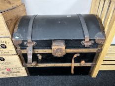 An early-20th century canvas and leather-bound domed trunk, width 78cm.