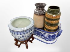 A reproduction Staffordshire blue and white porcelain footbath, two West German vases,