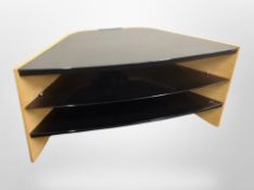 A contemporary oak effect TV stand,