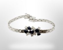 An 18ct white gold sapphire and diamond bracelet, approximately 1ct of diamonds, length 17.5cm.