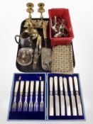 A pair of cast brass candlesticks, a chamber stick, several pieces of silver plate, cutlery, etc.