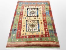 A polychrome Caucasian design rug,