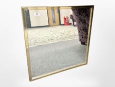 Two continental religious tiled panels, each 32cm x 47cm, together with a modern mirror (3).