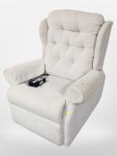 An electric reclining armchair