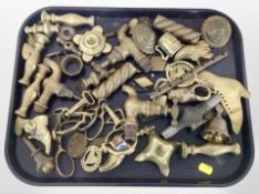 A quantity of brass taps, shoe ornaments, horse tack, etc.
