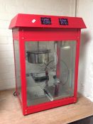 A commercial popcorn maker