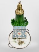 A brass and opaque glass pendant light shade,